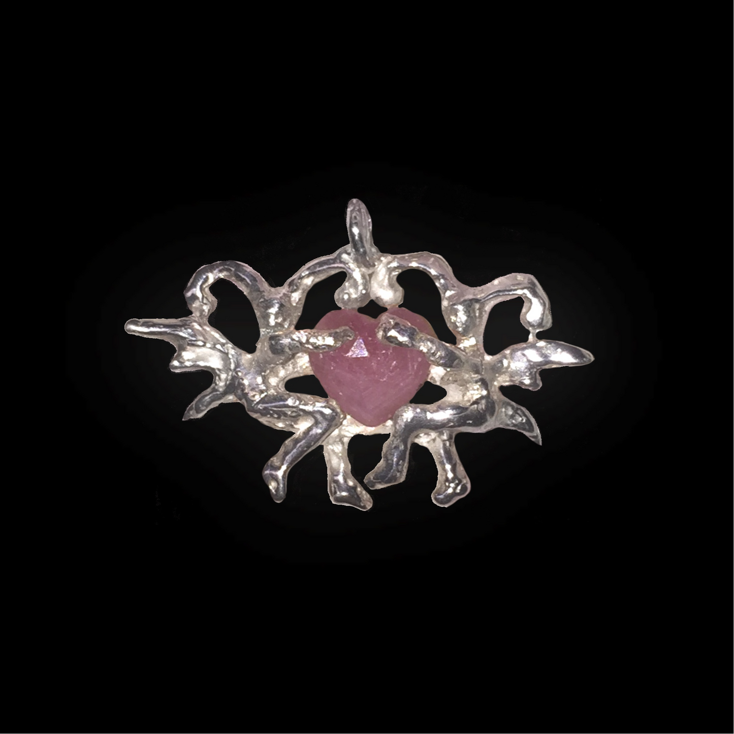 Two Silver Fairies Holding a Pink Sapphire Heart Pendant